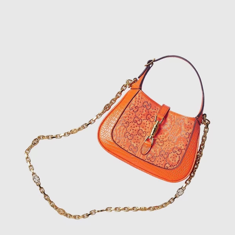 G*u*i top handle bags